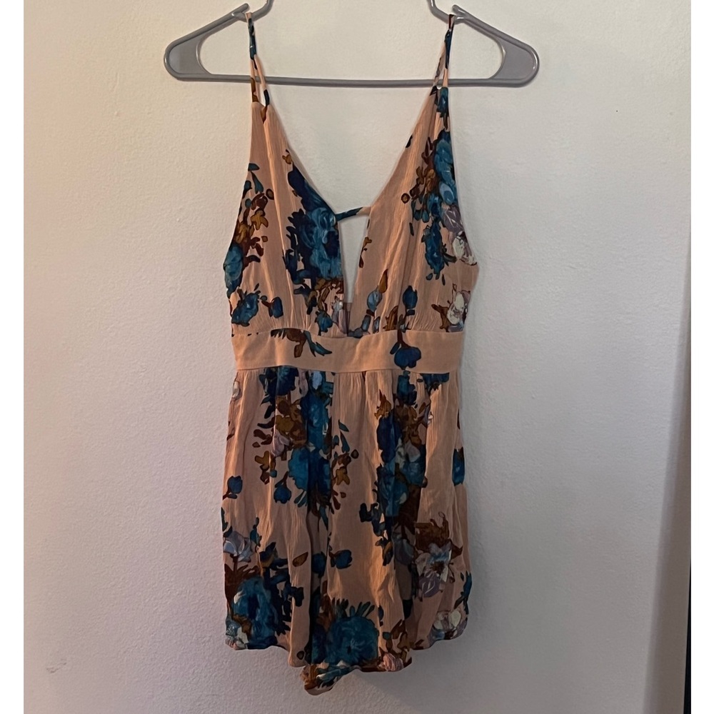 Coveted Clothing Woman’s Floral Romper - Picture 1 of 11